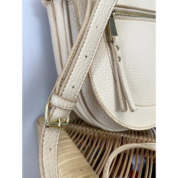 Earthtone Cream Pebbled Faux Leather Crossbody SaddleBag - Picture 11 of 13